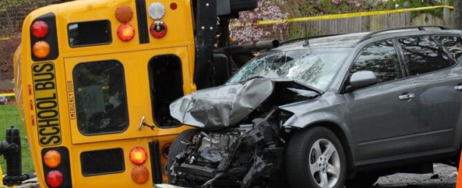 collision between a school bus and a car