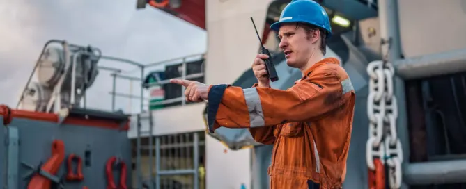 Maritime worker in safety gear on a vessel in the Gulf of Mexico
