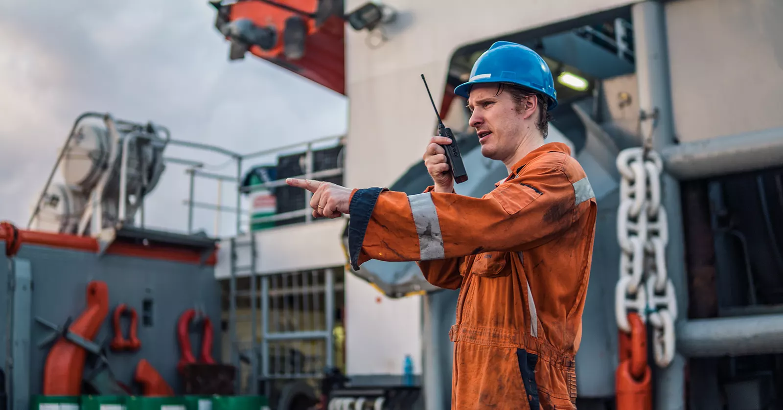 Maritime worker in safety gear on a vessel in the Gulf of Mexico