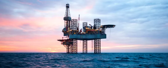 Offshore drilling for oil concept - Jack up rig in the middle of the sea.