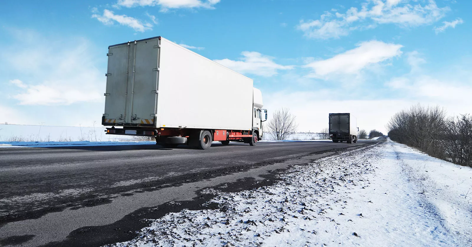 18-wheelers on the road during winter