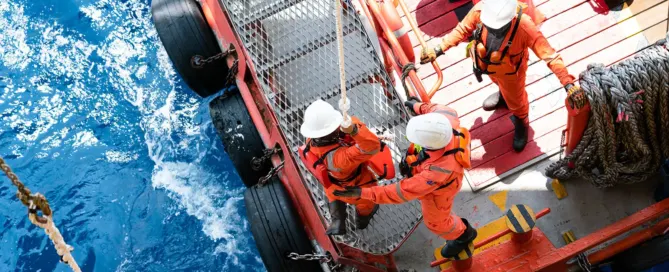 Seamen working at sea