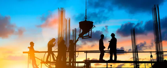 Construction workers working long hours