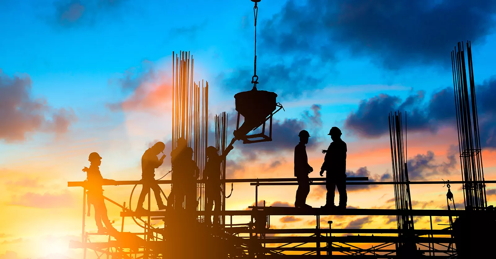 Construction workers working long hours